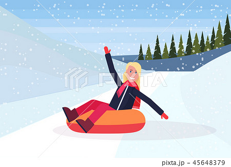 happy woman sledding on snow rubber tube winter vacation activity concept snowy mountains fir tree 45648379