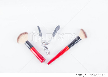 Set of decorative cosmetics on light colorful back Set of decorative cosmetics on light colorful back 45655646