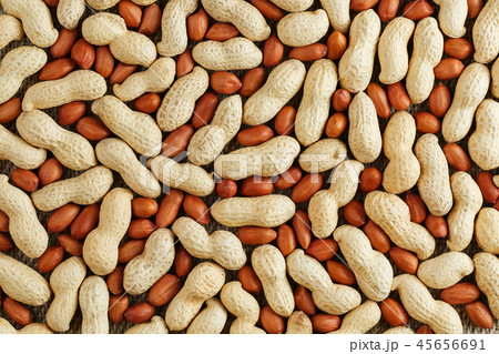 Peanuts in a shell mixed with peeled, the texture Peanuts in a shell mixed with peeled, the texture 45656691