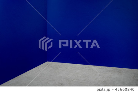 Empty corner blue wall and grey concrete floor Empty corner blue wall and grey concrete floor 45660840