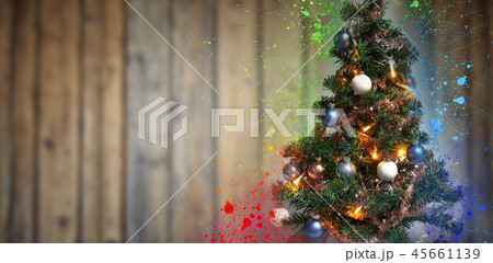 Xmass ball ornement tree against wooden wall 45661139