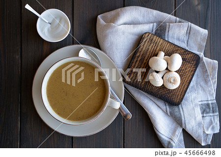 A bowl of delicious homemade cream of mushroom soup. A bowl of delicious homemade cream of mushroom soup. 45666498