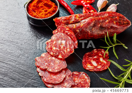 red chorizo sausage cut in slices red chorizo sausage cut in slices 45669773