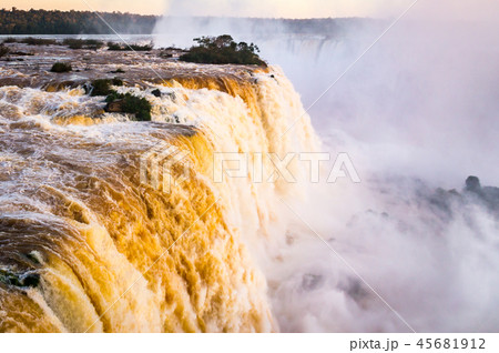 Beautiful Sunset Colors at Cataratas do Iguacu at Iguazu Falls, Foz do Iguacu, Parana State, Brazil Beautiful Sunset Colors at Cataratas do Iguacu at Iguazu Falls, Foz do Iguacu, Parana State, Brazil 45681912