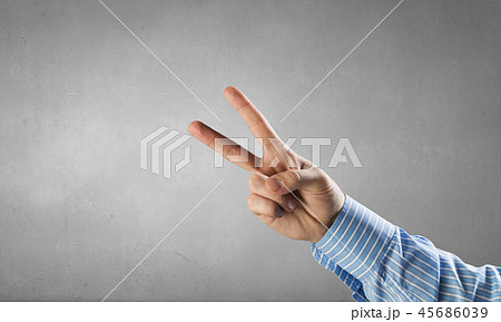 Man gesturing with fingers 45686039