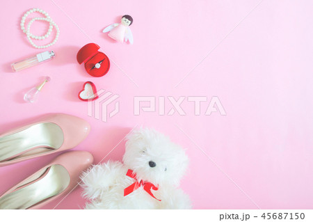 Creative flat lay of bride's essentials on pink Creative flat lay of bride's essentials on pink 45687150