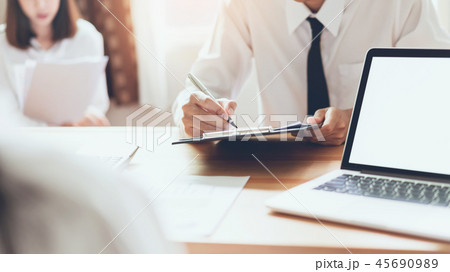 Business people working on laptop. Business people working on laptop. 45690989
