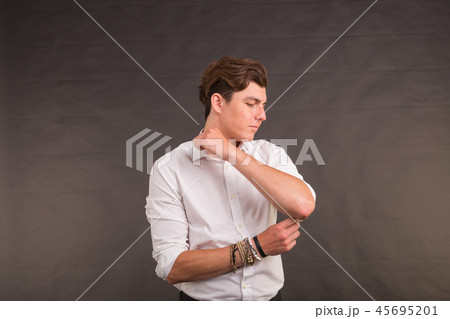People, style and self-confidence concept - handsome stylish man on brown background People, style and self-confidence concept - handsome stylish man on brown background 45695201