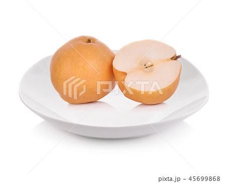 Nashi pear fruit on plate over white background Nashi pear fruit on plate over white background 45699868