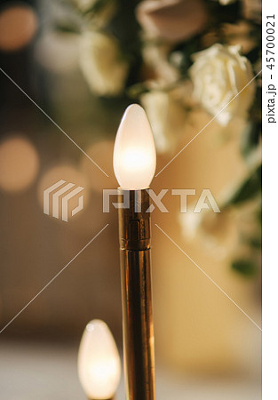 Details of wedding decoration. Wedding ceremony outside. Floral decoration. Gold, pink, powder and 45700021