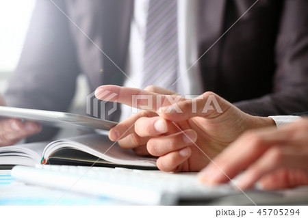Two businessman are looking and 45705294
