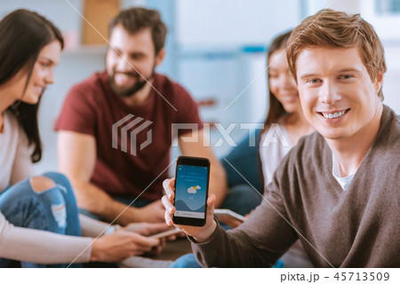 Happy jolly man using application 45713509