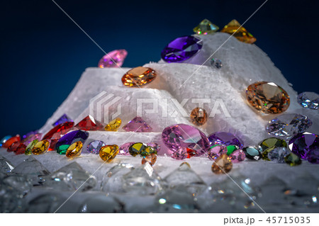 colorful diamonds on snowing background. colorful diamonds on snowing background. 45715035