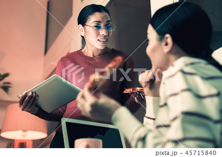 Pretty woman complaining at her boss Pretty woman complaining at her boss 45715840
