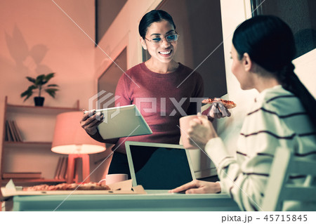 Smiling women discussing their new project 45715845