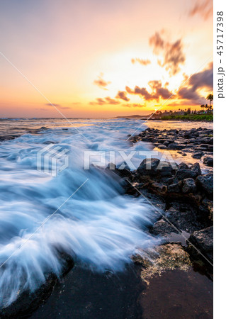 Evening Sunset at a Tropical Rocky Beach 45717398