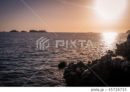 Sunset over the rocky Croatian coast 45726735