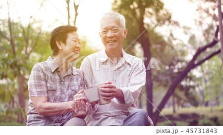Healthy Asian senior couple coffee park together Healthy Asian senior couple coffee park together 45731843