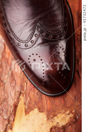 Brown leather chelsea boots polished. Closeup Brown leather chelsea boots polished. Closeup 45732472