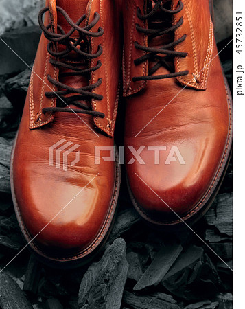 brown leather boots polish.boots.On charcoal. brown leather boots polish.boots.On charcoal. 45732851