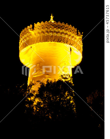 Big golden prayer wheel at night Big golden prayer wheel at night 45737615