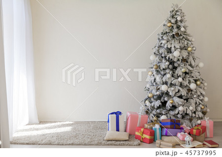 new year Christmas tree holiday gifts white interior winter decor new year Christmas tree holiday gifts white interior winter decor 45737995