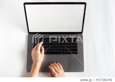 Lap top topview with hands on white background Lap top topview with hands on white background 45738240