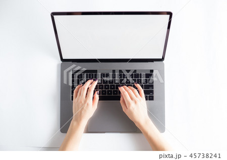 Lap top topview with hands on white background Lap top topview with hands on white background 45738241