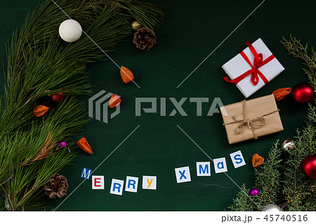 women's hands happy Christmas Gifts Christmas card celebration Christmas tree 45740516