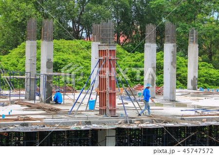 construction laborer team working on building  45747572