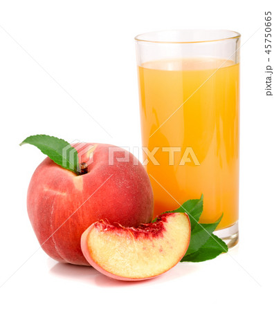 Glass of fruit juice and cut peaches isolated on white background Glass of fruit juice and cut peaches isolated on white background 45750665
