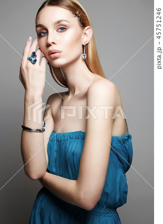 woman in blue dress. jewelry on beautiful girl 45751246