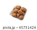 Pile of walnuts on a white background 45751424