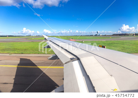 airplane wing view during plane landing or before 45754772