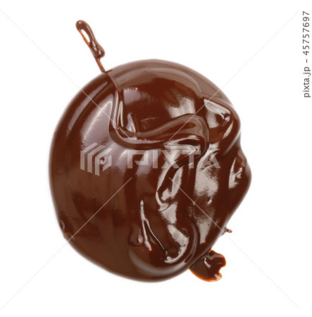 Hot melted chocolate pouring isolated on white background, top view 45757697