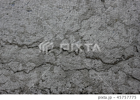 Gray old layered grungy textured plaster wall Gray old layered grungy textured plaster wall 45757775