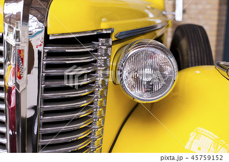 Close-up of headlights of luxurious vintage vehicle Close-up of headlights of luxurious vintage vehicle 45759152