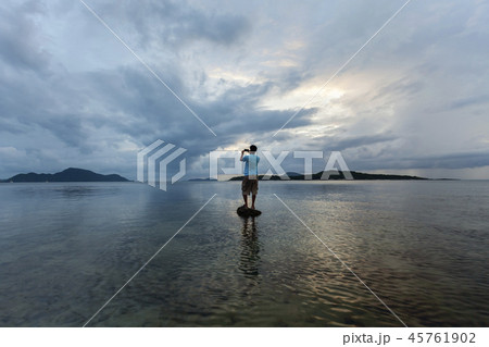 Alone man tourist standing on the stone Alone man tourist standing on the stone 45761902