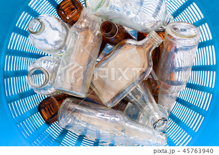 Glass bottles in waste basket. Glass bottles in waste basket. 45763940