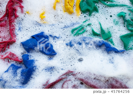 Washing clothes, colorful clothes soaked. Washing clothes, colorful clothes soaked. 45764256