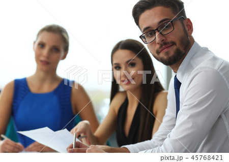 Handsome smiling bearded clerk man wearing glasses Handsome smiling bearded clerk man wearing glasses 45768421