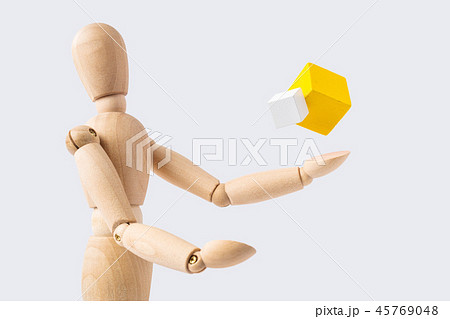 wooden mannequin with surreal wood cube 45769048