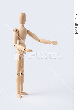 wooden mannequin with welcome gesture 45769068