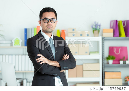 Businessman at his own small home office. 45769087