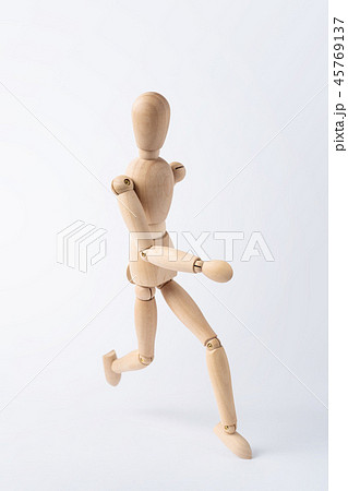 running wooden mannequin isolated on white running wooden mannequin isolated on white 45769137