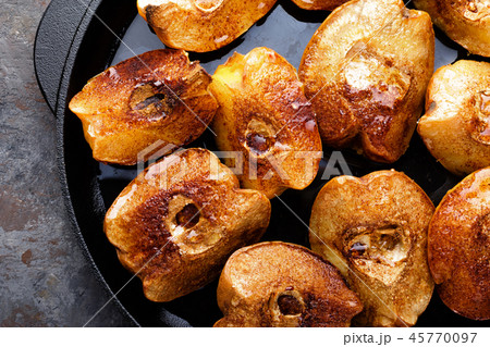 Apple quince baked with honey and cinnamon Apple quince baked with honey and cinnamon 45770097