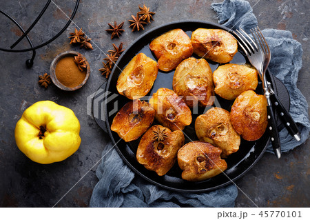 Apple quince baked with honey and cinnamon 45770101