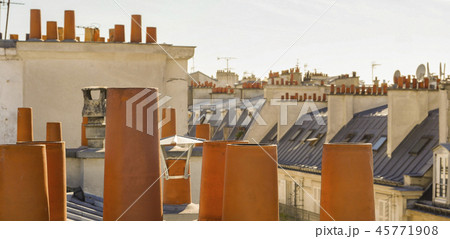 The roofs of Paris and its chimneys under a clouds sky The roofs of Paris and its chimneys under a clouds sky 45771908