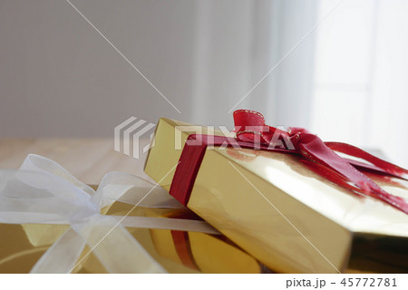 Gift boxes on the wooden table Gift boxes on the wooden table 45772781