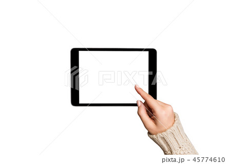 female hands in sweater using tablet pc female hands in sweater using tablet pc 45774610